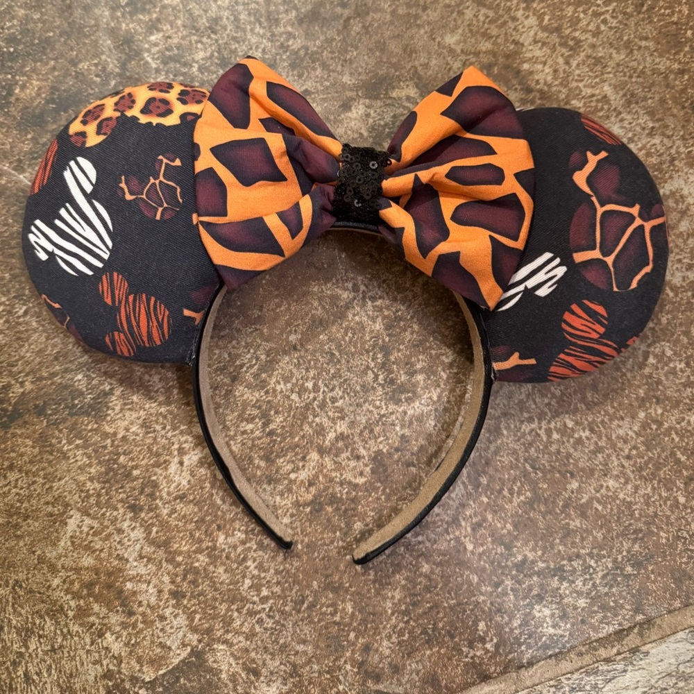 Disney Animal Print Minnie Ears Headband in Black and Orange